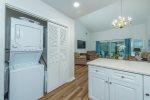 Newly renovated kitchen  with stackable washer/dryer